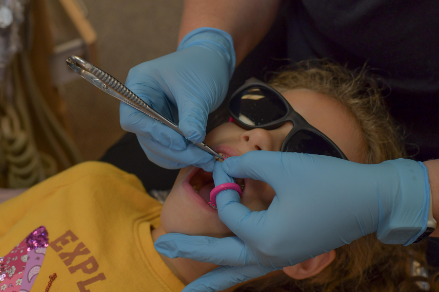 Child getting braces adjusted