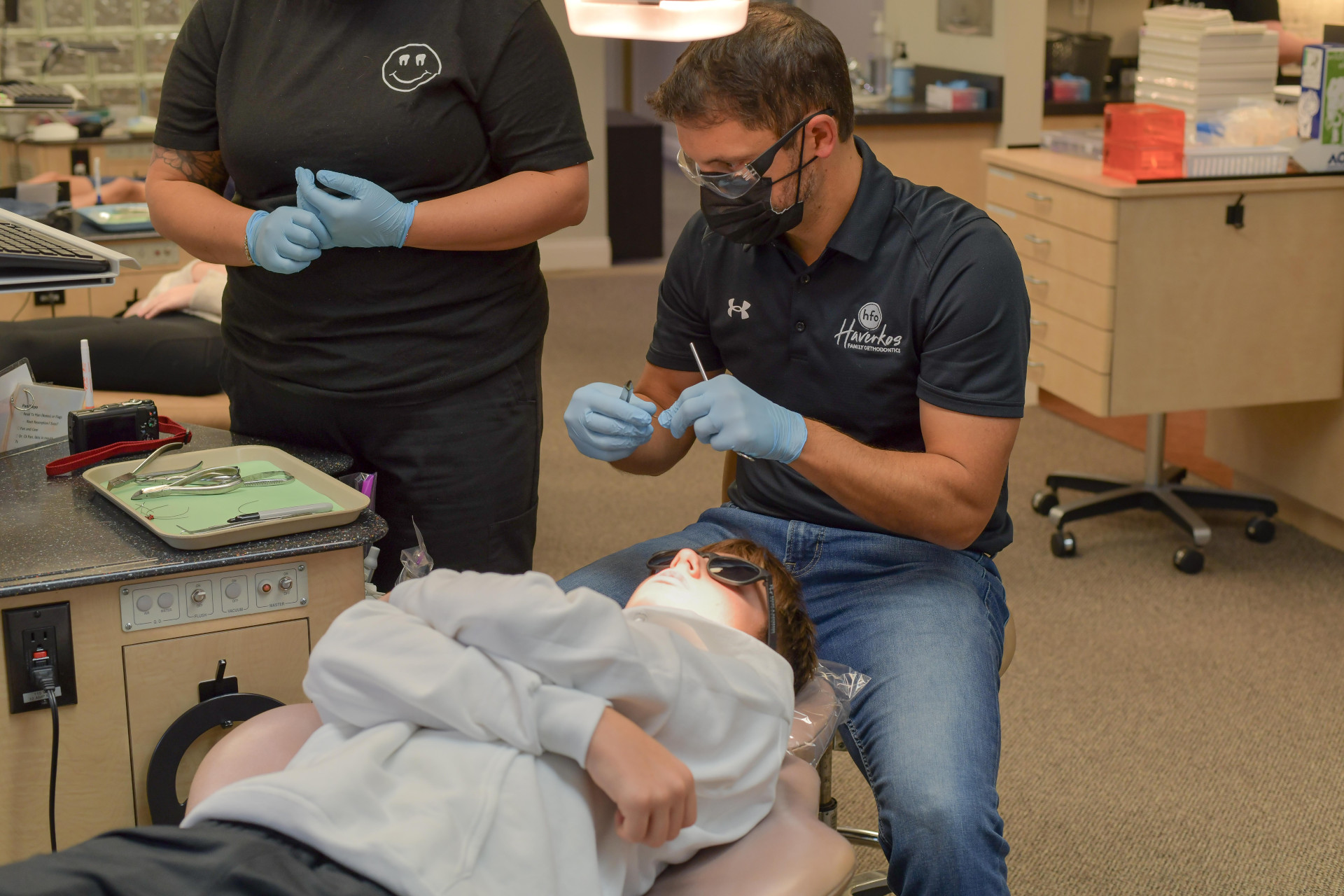Dr. Haverkos treating a patient during an appointment