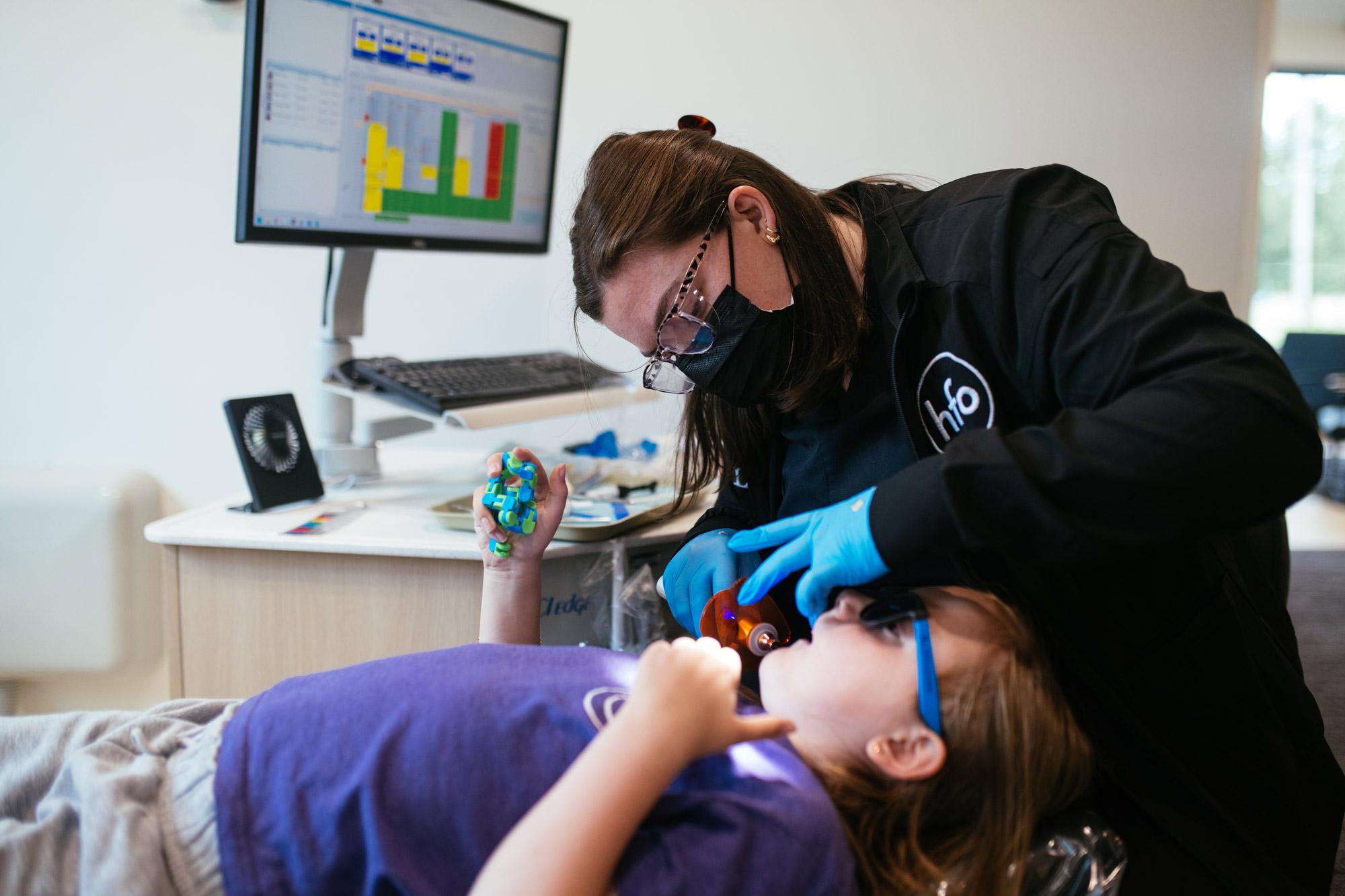 Young child comfortably receiving early Phase 1 orthodontics in Cincinnati at Haverkos Family Orthodontics